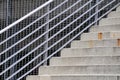 Stairway alongside facade with metal grid