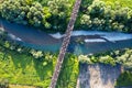 Steel railroad bridge above a small river