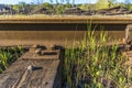 Steel rails bolted down to wooden railroad ties. Royalty Free Stock Photo