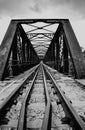 Steel railway bridge in black and white. Royalty Free Stock Photo