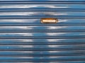 Steel roll up door with mailbox