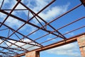 Steel roof trusses details. Steel roof trusses sitting on concrete pole view from inside home factory.