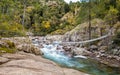 Steel rope bridge across La Figarella at Bonifatu in Corsica Royalty Free Stock Photo