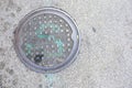 Steel Sanitary Manhole Cover on Asphalt City Street