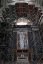 Steel scaffold frame on side altar in classicistic Primatial Basilica of the Blessed Virgin Mary Assumed Into Heaven