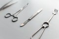 Steel scalpel with medical tools on a white table. Royalty Free Stock Photo