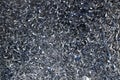 Steel scrap materials recycling. Abstract, background and texture of metal shavings. Royalty Free Stock Photo