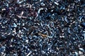Steel scrap materials recycling. Abstract, background and texture of metal shavings. Aluminum chip waste Royalty Free Stock Photo