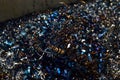 Steel scrap materials recycling. Aluminum chip waste after machining metal parts on a cnc lathe.