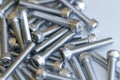 Set of screws close up. Macro photo of screws on a white background. Macro photo chromed screws, screw background, steel screw, Royalty Free Stock Photo