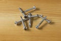 Steel Self-Drilling Screws Flat Head on wooden board Royalty Free Stock Photo