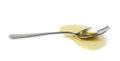 Steel spoon in a puddle of olive oil Royalty Free Stock Photo