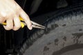 Steel stab on tire. Royalty Free Stock Photo