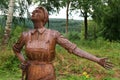 Steel statue commemorating war work. Royalty Free Stock Photo