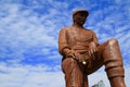 Steel statue set against great sky