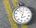 Steel stopwatch on the road.