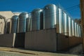 Steel storage tanks at Aurora Winery on street