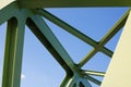 Steel structure close-up of a green painted bridge