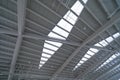 Steel structure of modern terminal station building roof. Metal windows glass facade frames supported. Abstract interior Royalty Free Stock Photo