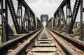 Steel structure of railway bridge, railway rail with vanishing point Royalty Free Stock Photo