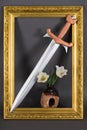 Steel sword with bronze hilt and white tulip flowers