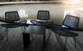 Steel table and three chairs for relaxing or meeting Royalty Free Stock Photo