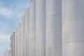 Steel tanks for wine fermentation at a modern winery. Large brewery silos for barley or beer Royalty Free Stock Photo