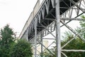 Steel technical design of overhead crossing. industrial footbridge on sky background