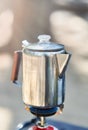 Steel travel kettle on the primus fire