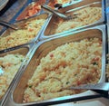 Steel trays with food in the canteen of the self-service Royalty Free Stock Photo