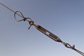 Steel turnbuckle holding hook eye Royalty Free Stock Photo