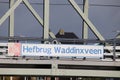 Steel vertical lifting bridge named Hefbrug Waddinxveen over river Gouwe between Alphen and Gouda in the Netherlands