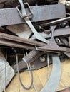 Steel wasted and Iron scrap in junk yard,rust and damaged metal parts pilled together Royalty Free Stock Photo