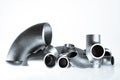 Steel welding fittings and connectors. Elbow, flanges and tee. Royalty Free Stock Photo