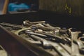 Steel wrenches in a old toolbox drawer. Royalty Free Stock Photo