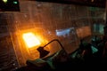 Steelworker in the control cabin of the rolling mill Royalty Free Stock Photo