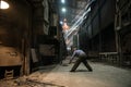 Steelworker at work near the arc furnace Royalty Free Stock Photo