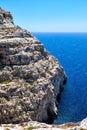 Steep cliff over Mediterranean sea on south of Malta island Royalty Free Stock Photo