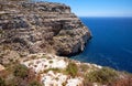 Steep cliff over Mediterranean sea on south of Malta island Royalty Free Stock Photo