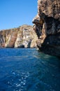 Steep cliff over Mediterranean sea on south part of Malta island Royalty Free Stock Photo