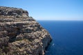 Steep cliff over Mediterranean sea on south part of Malta Royalty Free Stock Photo