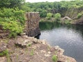 An arch bridge was built along the deep pool of the crater.