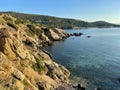 Steep cliffs that descend directly into the sea in Sarti resort, Greece