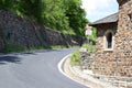 steep curve around a medieval building