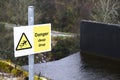 Steep deep drop danger warning sign waterfall Royalty Free Stock Photo