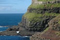 Steep green cliffs