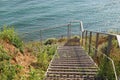 Steep metal staircase down to the beach Royalty Free Stock Photo