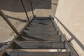 Steep metal stairs. Dangerous metal staircase