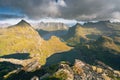 Steep mountains of Lofoten Island on a sunny arctic day. View from the top of Hermannsdalstinden peakHiking mountains of Lofoten,