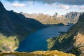 Steep mountains of Lofoten Island on a sunny arctic day. View from trail to Hermannsdalstinden peak. Hiking mountains of Lofoten,